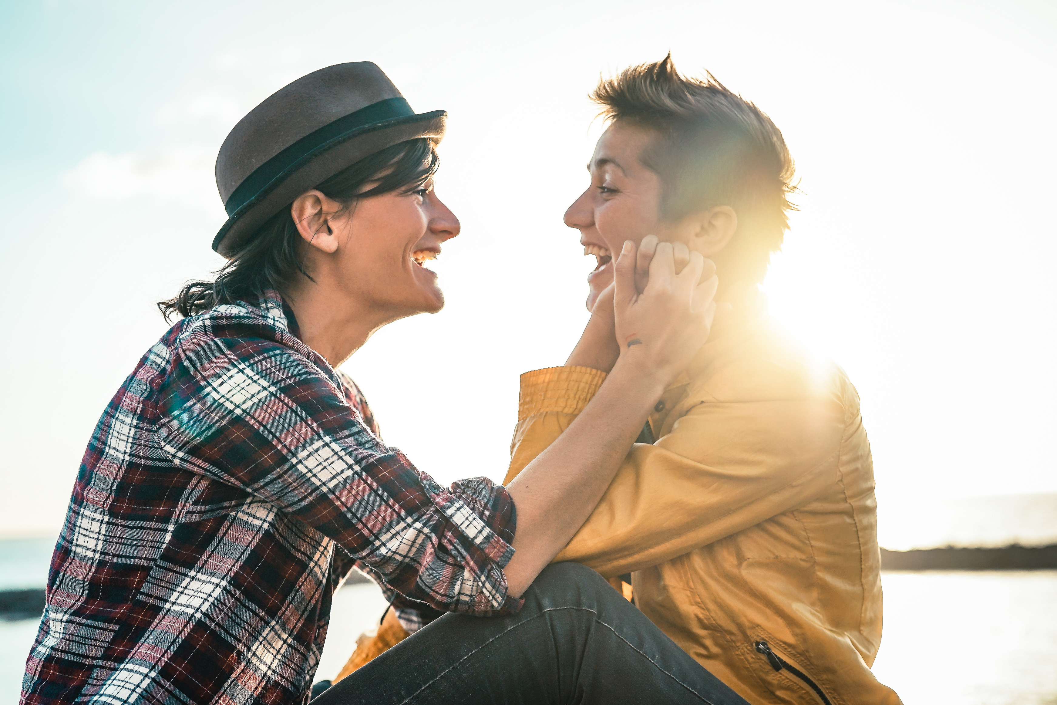 women laughing and flirting with one another