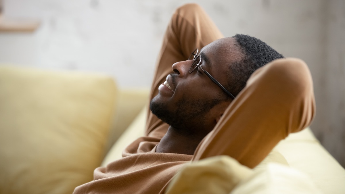 Man sitting on couch