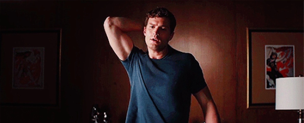 jamie dornan pulling shirt off in fifty shades of grey