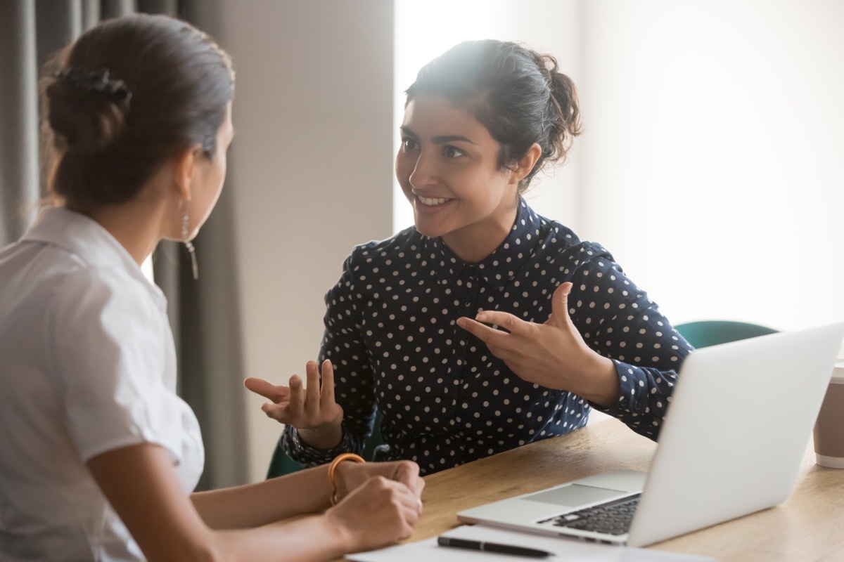 woman convincing coworker