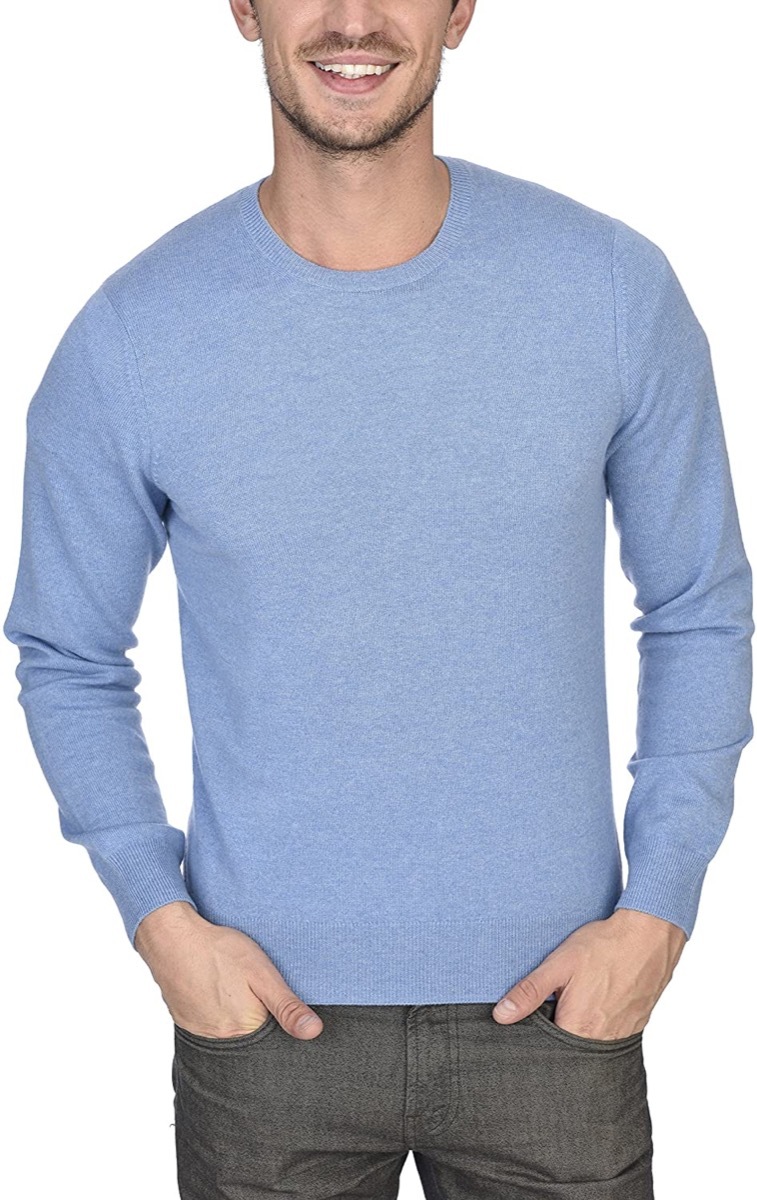 man in blue cashmere sweater