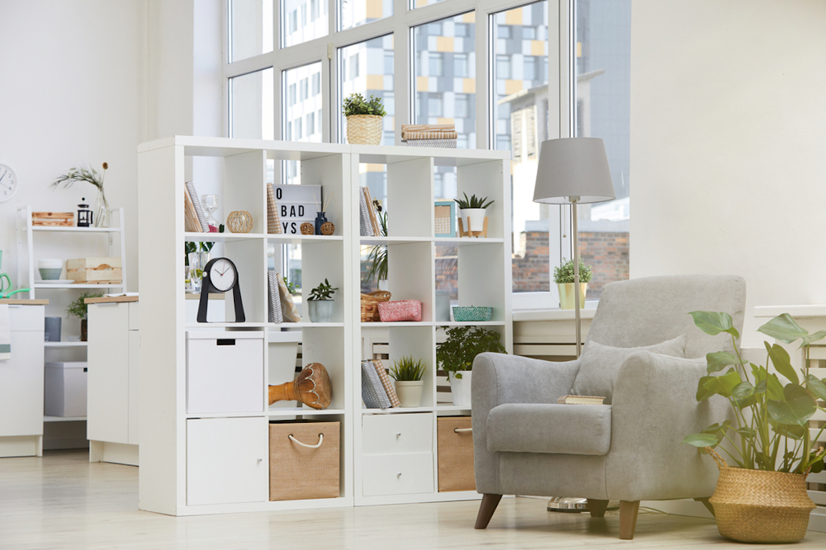 white open bookcase in living room of apartment