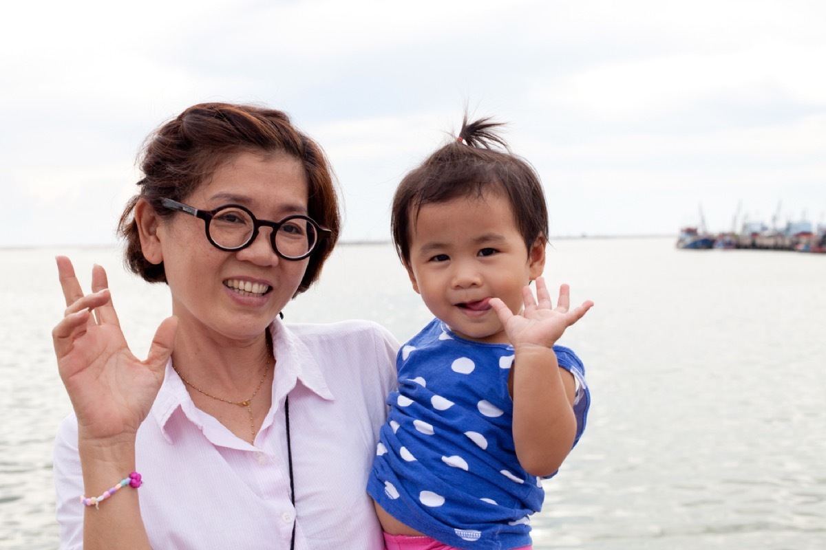 grandmother holding baby girl on the beach, things grandparents should never do