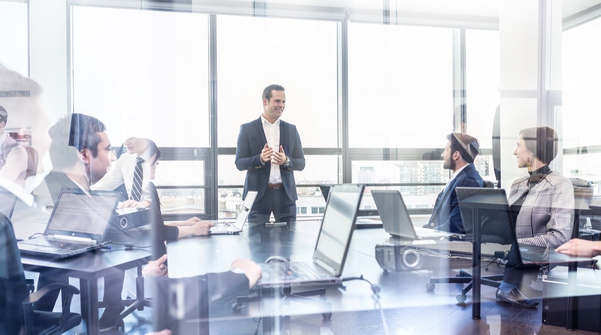 A team of business people talking in an office