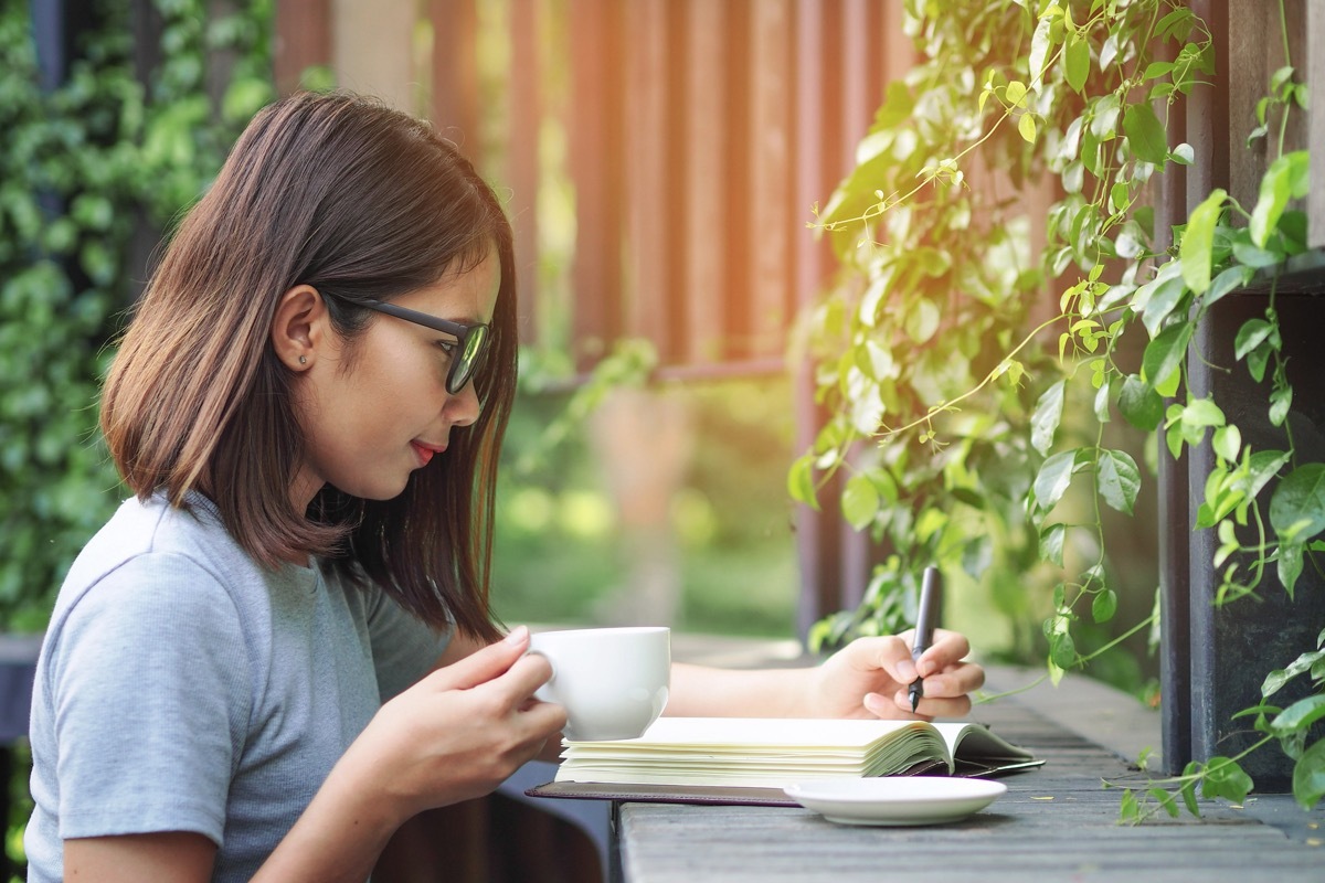 woman and her journal