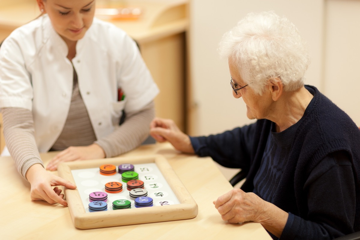 older woman taking cognitive memory test