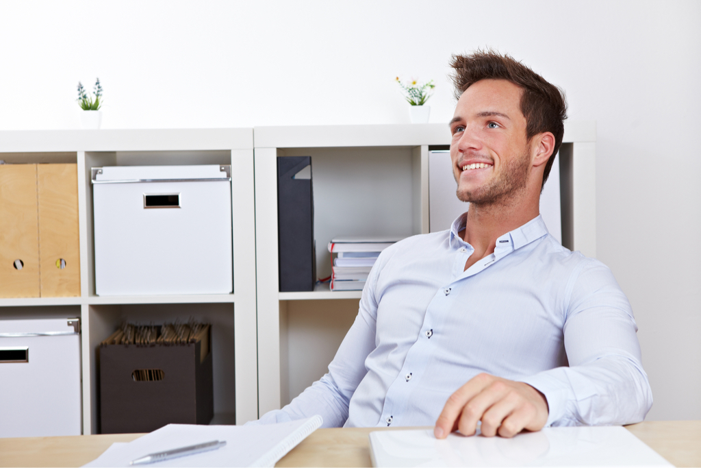 Man Leaning Back in chair Body Language That Kills First Impressions