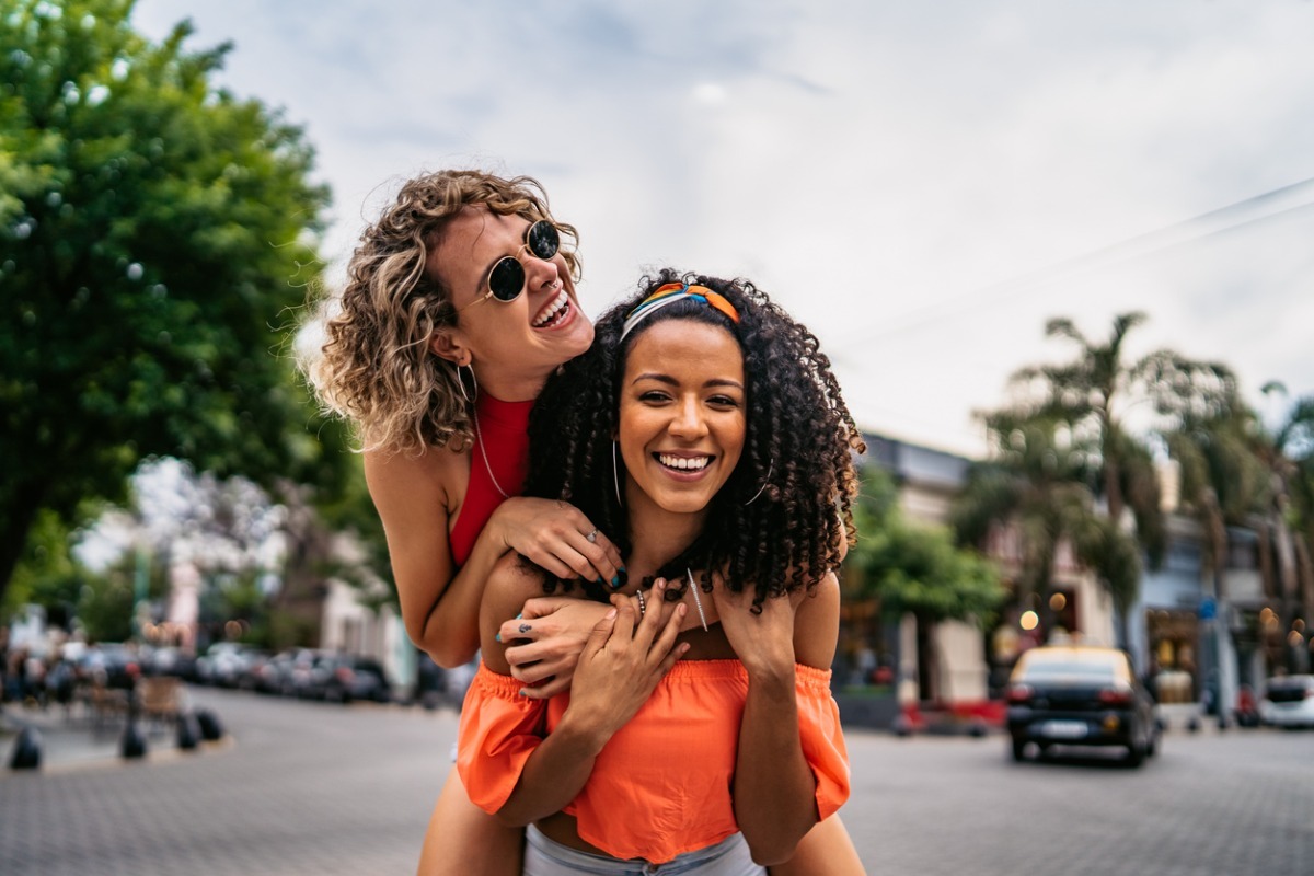 two best friends laughing