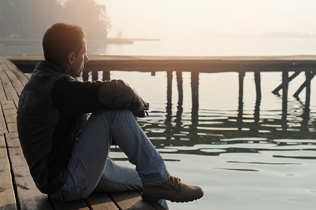 deal breaker, man alone on dock, thinking, water mother in law dating a mama's boy