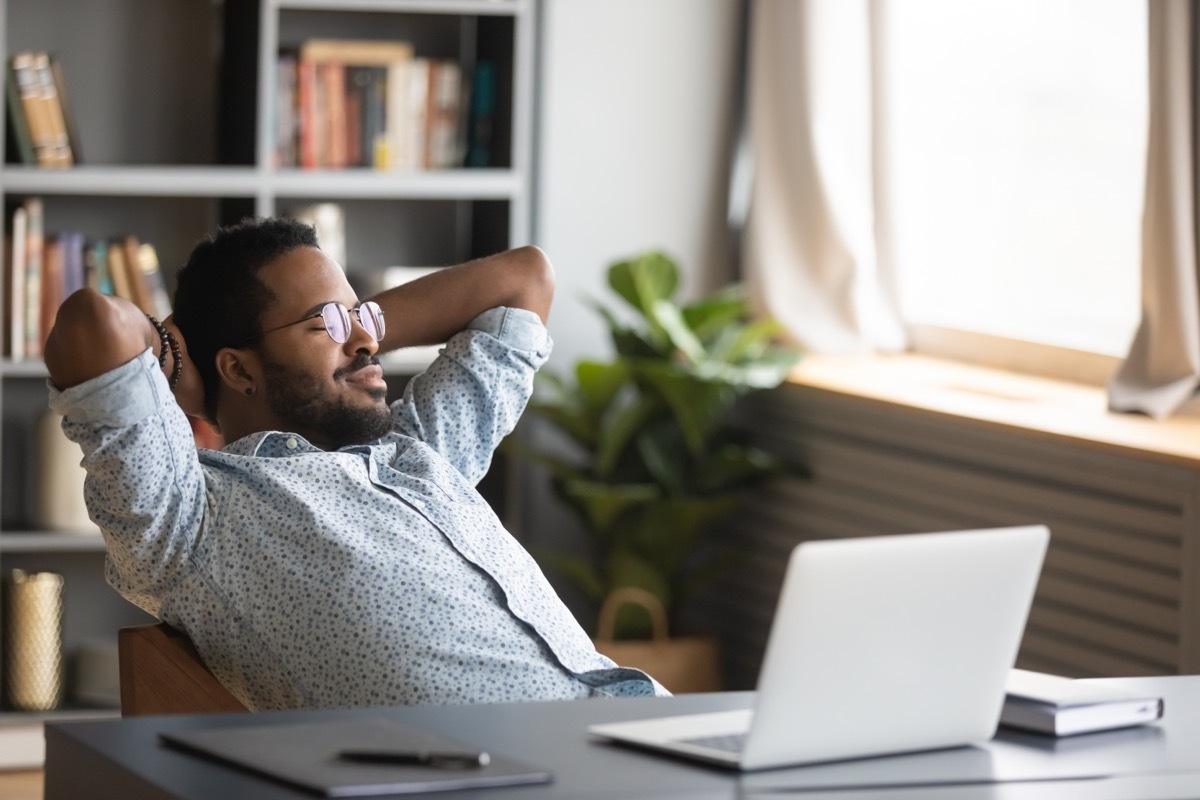 Young Man Chilling Out While Working