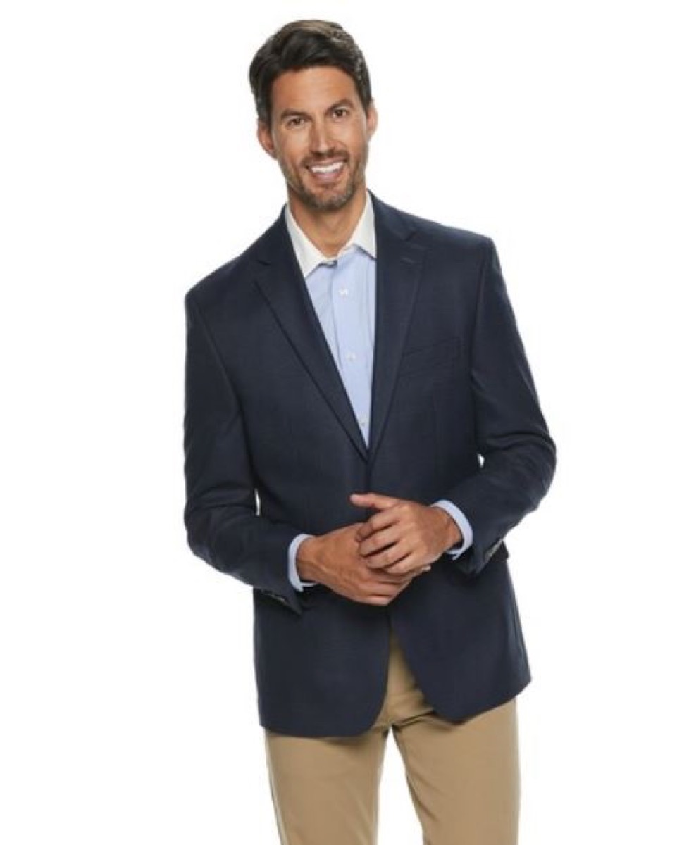 Man wearing khakis and sports coat