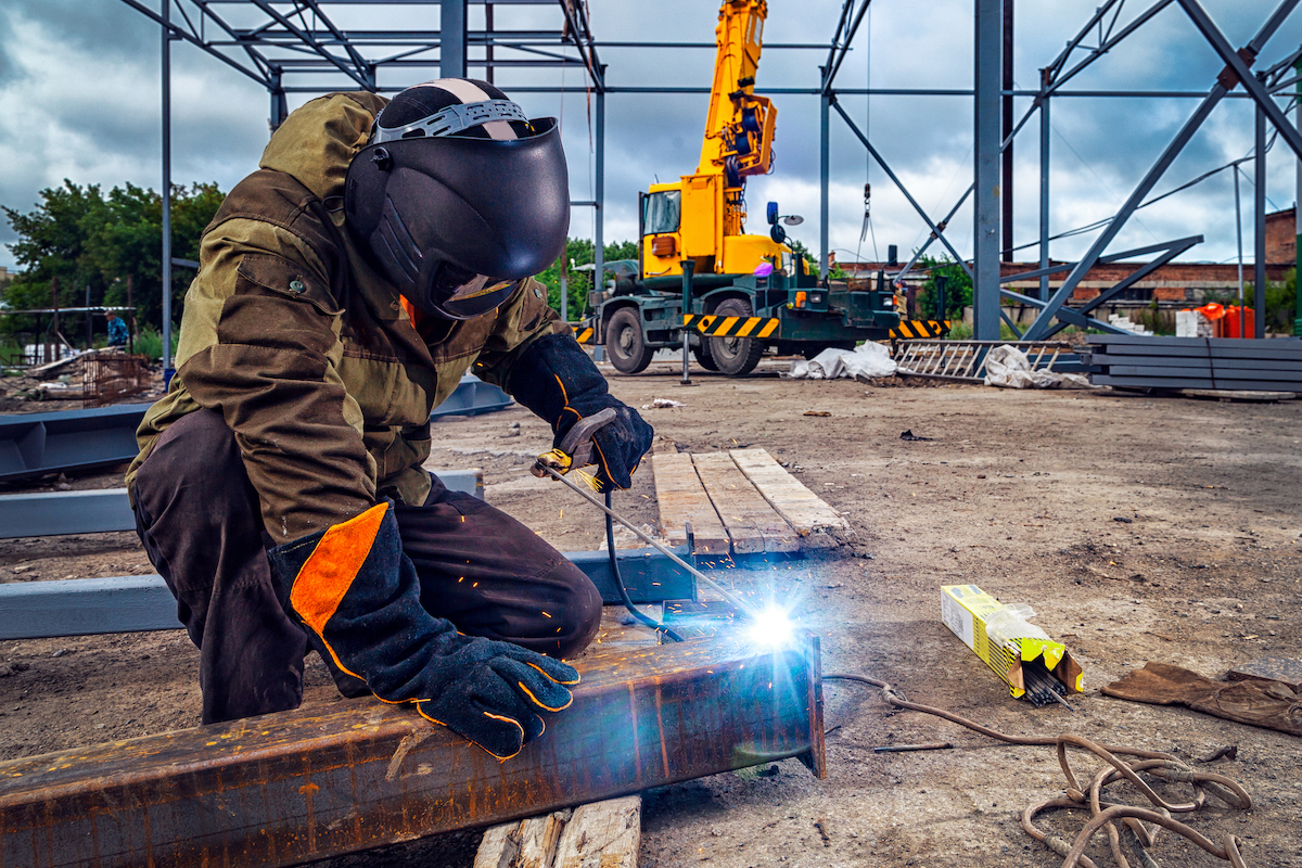 Steel worker welding