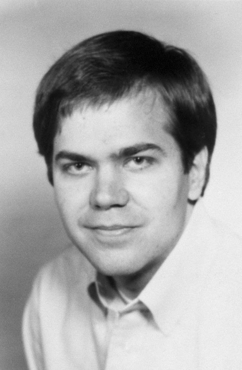 A portrait of John Hinckley Jr. circa early '80s