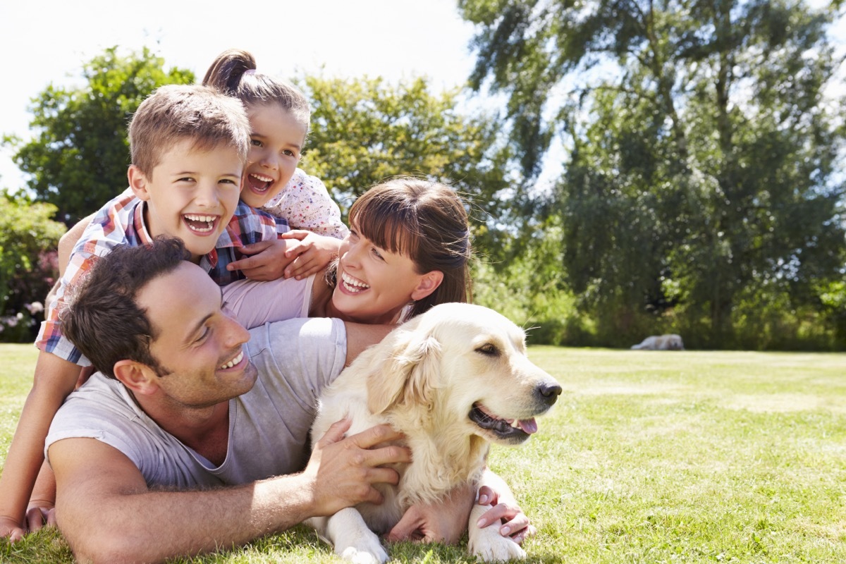 Family Laughing in the Yard