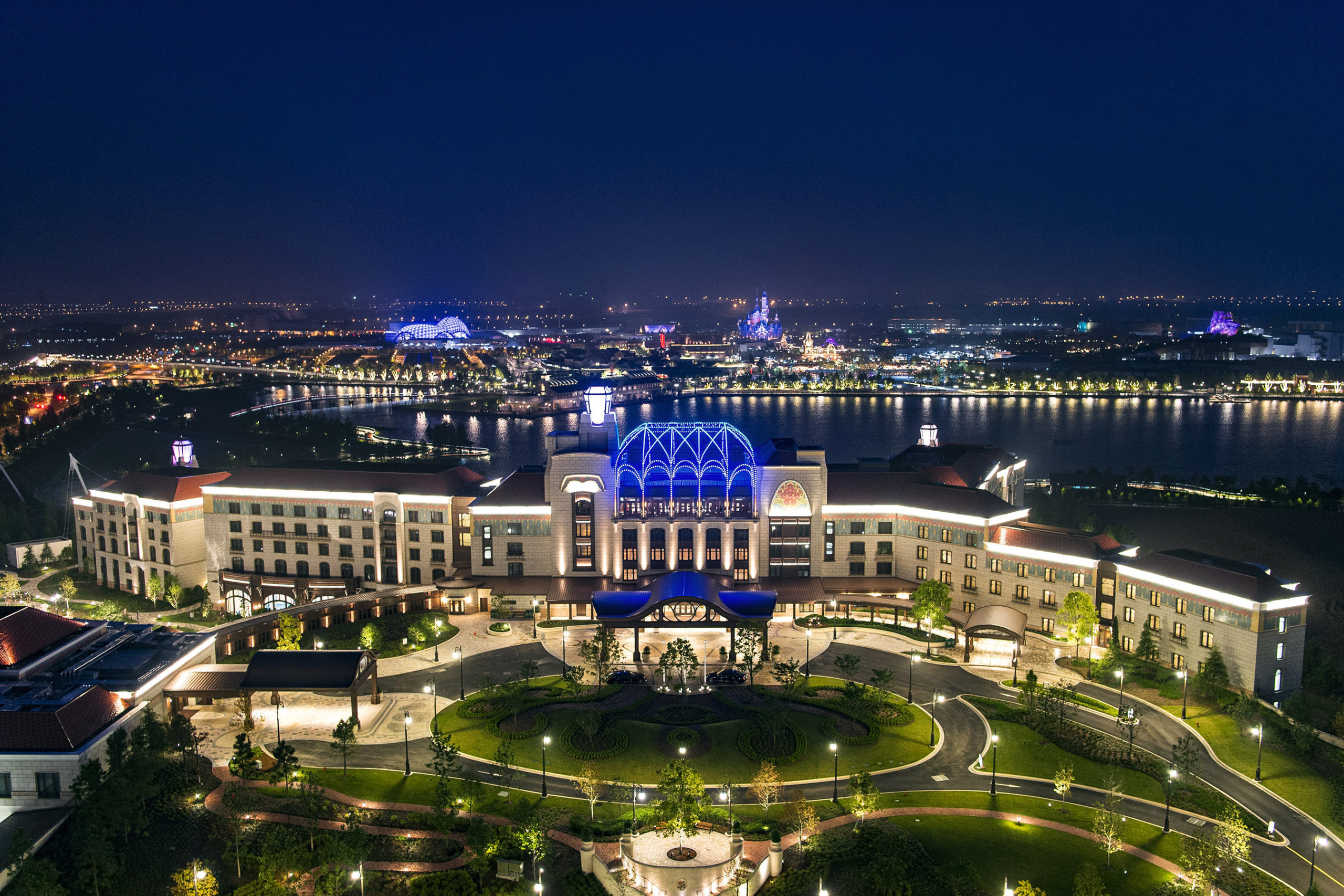 aerial view of the shanghai disneyland hotel at night