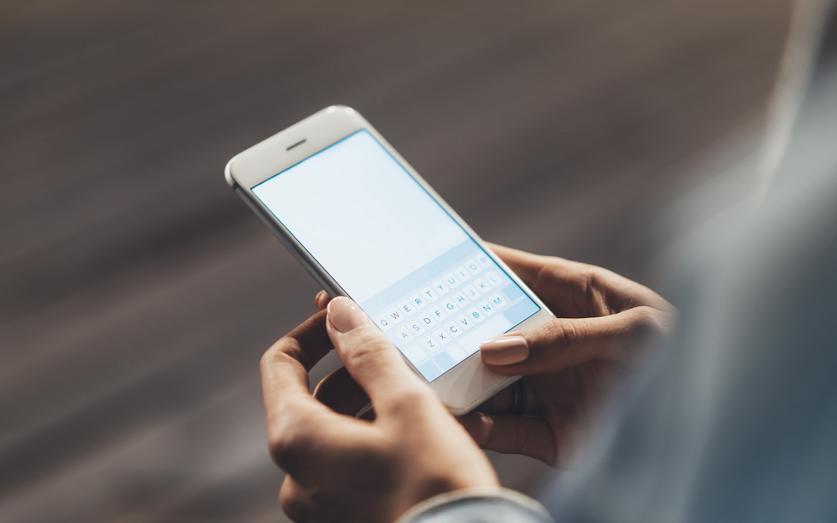 Woman Typing a Text Message.