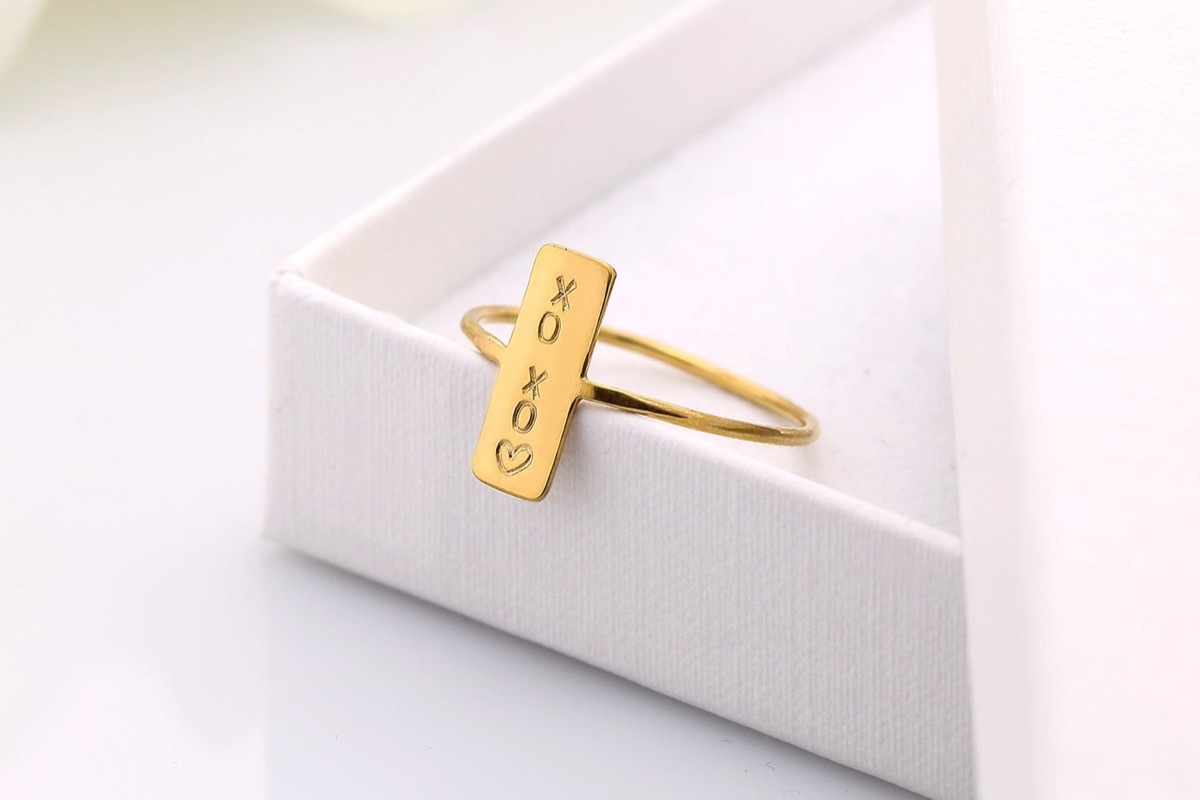 Engraved gold bar ring in box