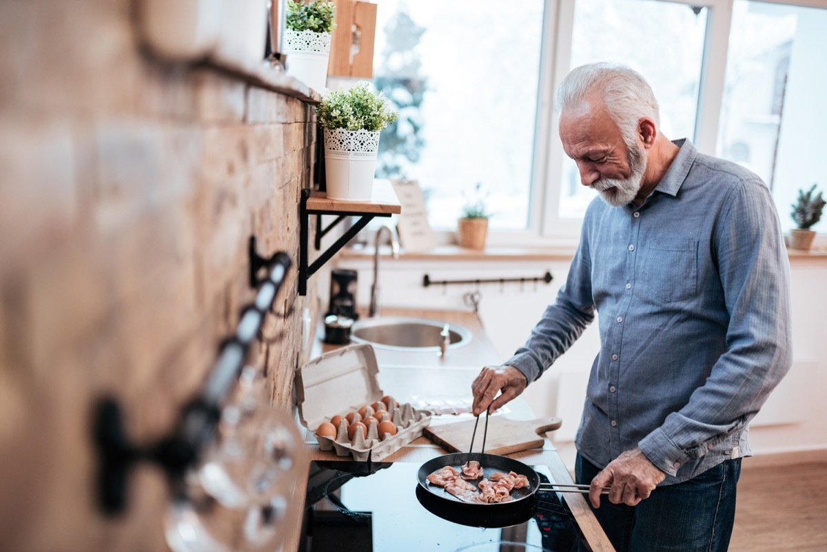 man cooking for his wife as a surprise