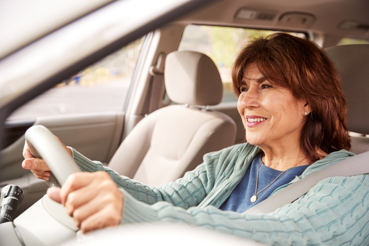 Older woman driving a car