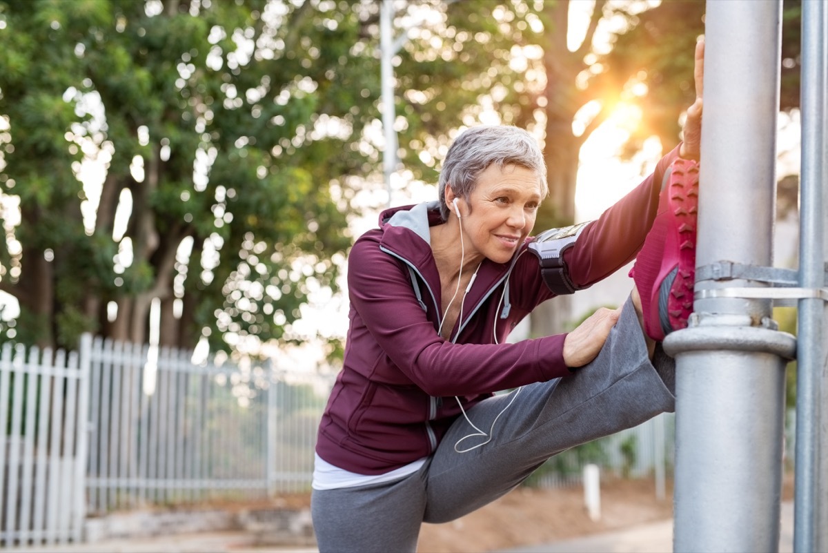 Woman stretching before run