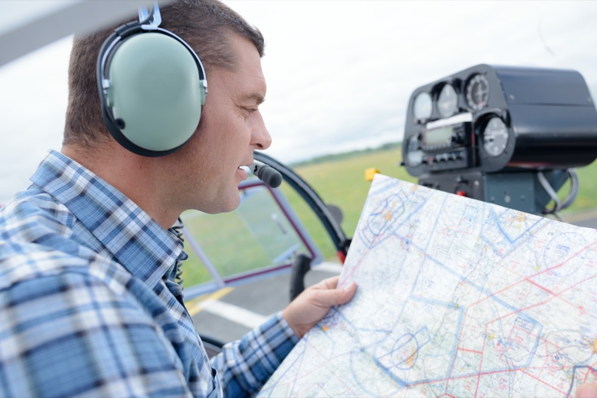 pilot studying a map