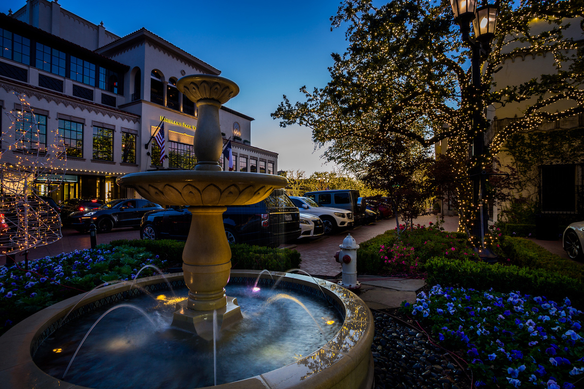 Highland Park Village in dusk. Christmas lights and the beautiful fountain at twilight