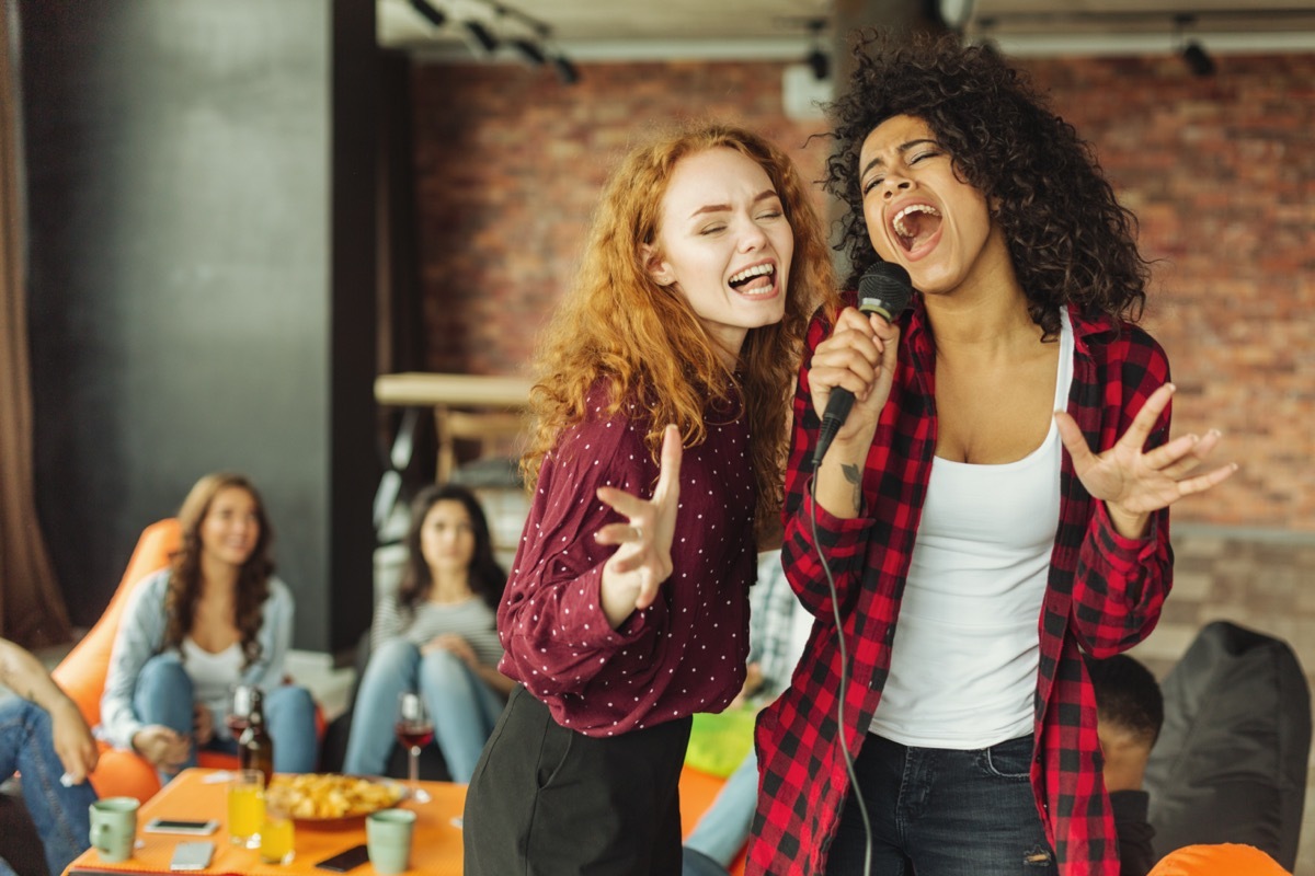 Women singing karaoke