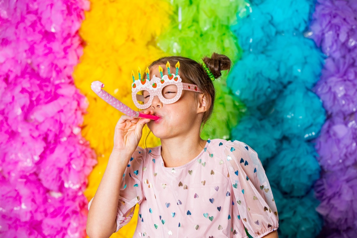 little girl celebrating birthday and sending warmest wishes