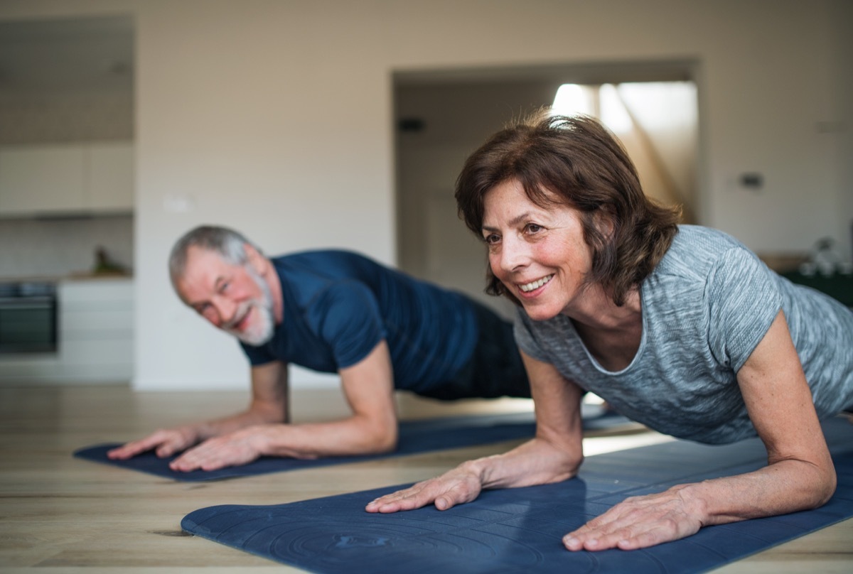 Older couple doing plank