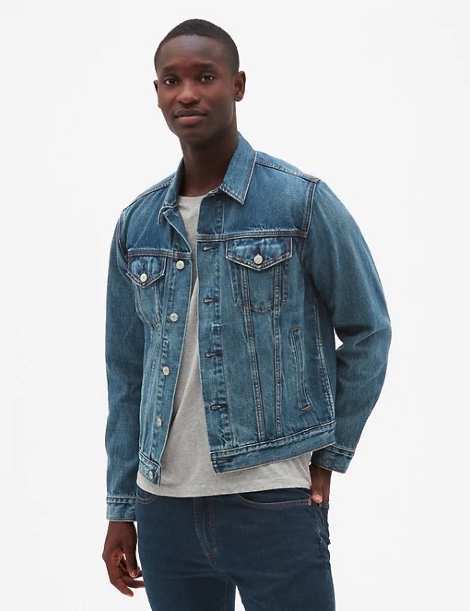 young black man in denim jacket