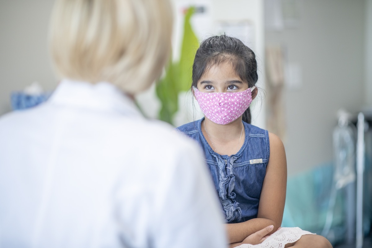 medical professional with young child patient.