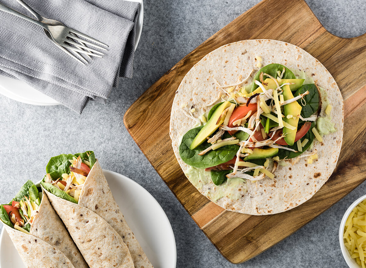 tacos with veggies on a table