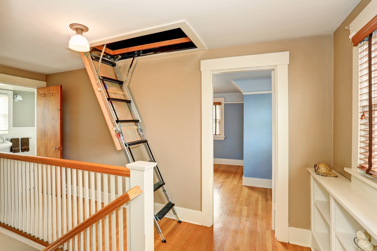 a ladder to an attic in a modern home