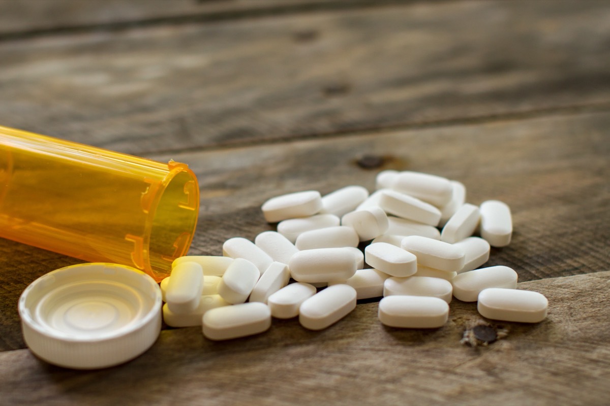 prescription pills spilling onto table