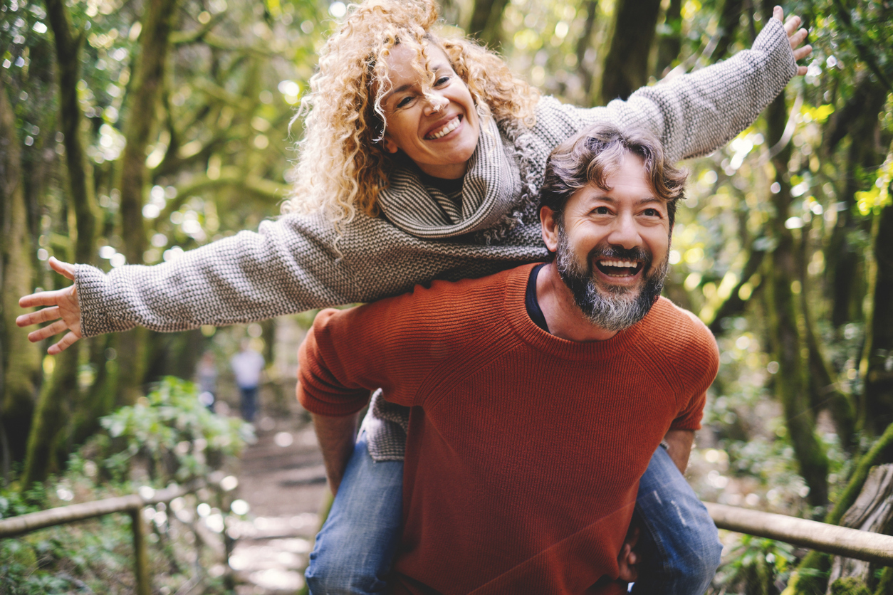 older couple having fun outside