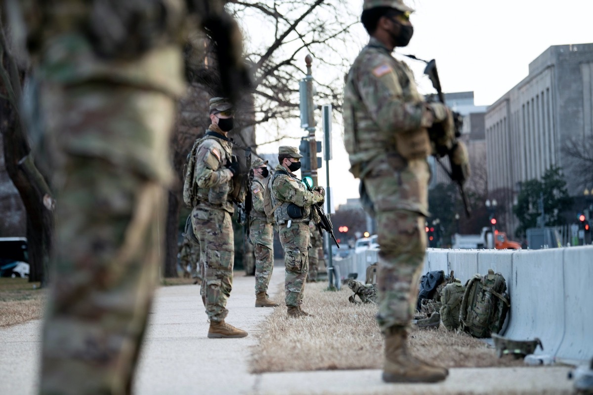 national guard members standing guard on capitol hill