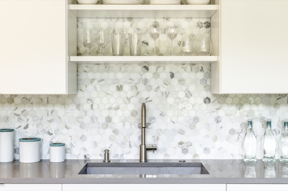 White and gray kitchen with backsplash