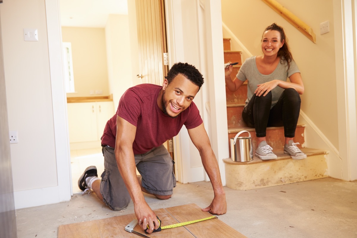 homeowners decorating their house