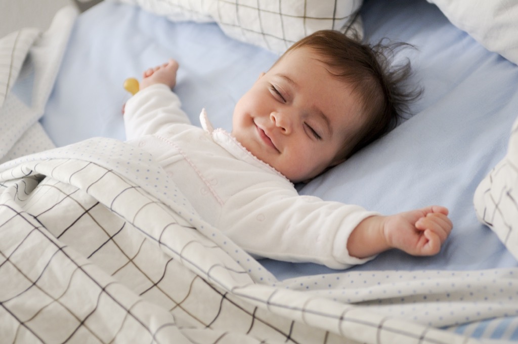 baby sprawled out in bed - literary baby names 