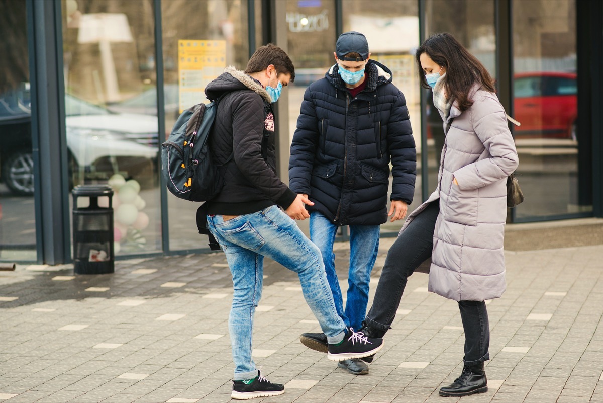 Friends hanging out with masks on during the coronavirus pandemic