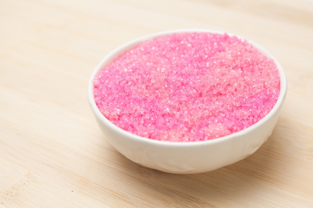 Pink sugar in a white bowl