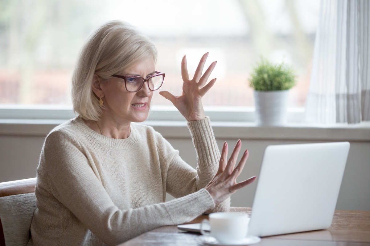 woman angry using computer