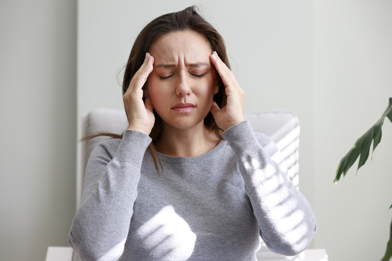 Woman with headache.